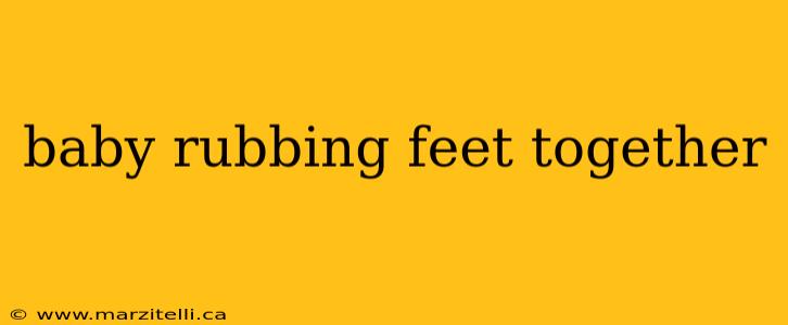 baby rubbing feet together